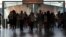 Commuters arrive at Lisbon's Terreiro do Paco ferry station, July 3, 2013. Portugal's financial markets went into a steep nosedive Wednesday as the government teetered on the verge of collapse.