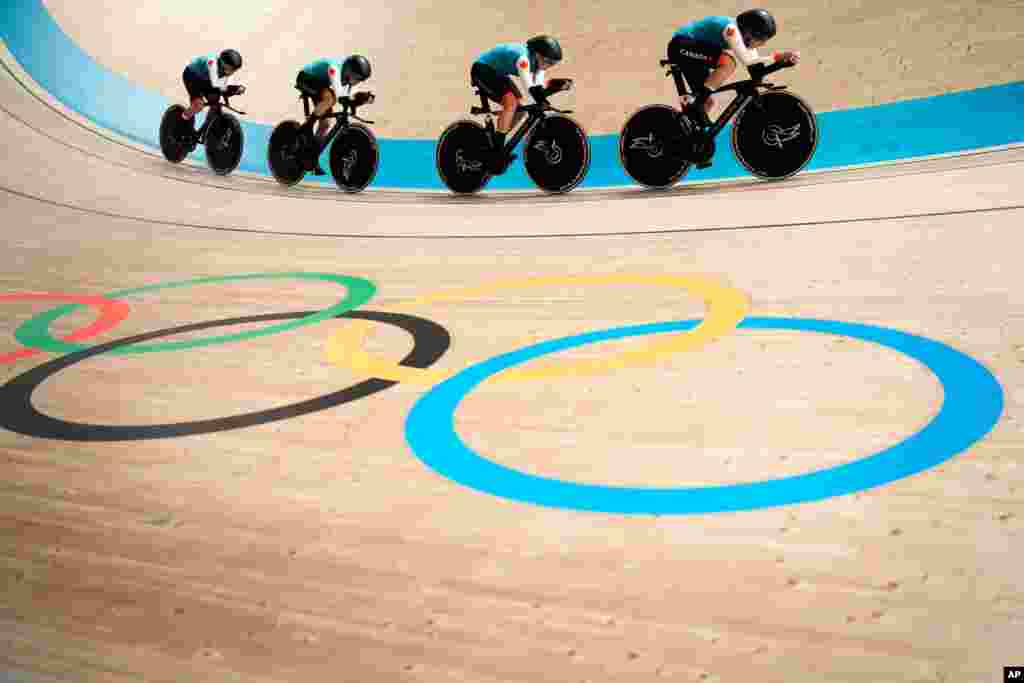 Team Canada competes during the track cycling women&#39;s team pursuit at the 2020 Summer Olympics in Izu, Japan.