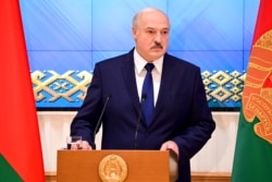FILE - Belarusian President Alexander Lukashenko speaks during a meeting with the country's political activists in Minsk, Belarus, Sept. 16, 2020.