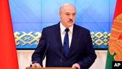 Belarusian President Alexander Lukashenko speaks during a meeting with the country's political activists in Minsk, Belarus, Sept. 16, 2020.