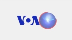 VOA60 America- December 19, 2014