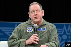 FILE - U.S. Air Force, Gen. James Hecker, commander of U.S. Air Forces in Europe, speaks at the Air and Space Forces Association 2023 Warfare Symposium in Aurora, Colo., March 8, 2023. The U.S. is making precautionary plans to evacuate two key drone bases if it becomes necessary.