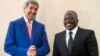 President of the Democratic Republic of Congo (DRC) Joseph Kabila (R) welcomes U.S. Secretary of State John Kerry at the Palais de la Nation in Kinshasa May 4, 2014. 