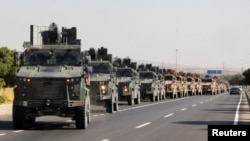 A Turkish miltary convoy is pictured in Kilis near the Turkish-Syrian border, Turkey, Oct. 9, 2019.