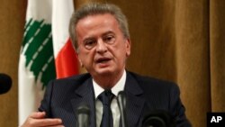 FILE - Riad Salameh, the governor of Lebanon's Central Bank, speaks during a press conference, in Beirut, Lebanon, Nov. 11, 2019.