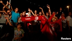 Demonstrators demand ouster of Islamist-dominated government during a protest outside the Constituent Assembly headquarters, Tunis, August 3, 2013.