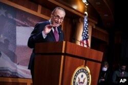 FILE - Senate Majority Leader Chuck Schumer, D-N.Y., speaks at the Capitol in Washington, March 6, 2021.
