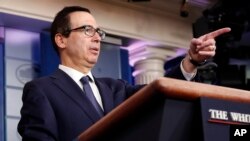 Treasury Secretary Steven Mnuchin announces the threat of sanctions on Turkey in the Briefing Room of the White House in Washington, Oct. 11, 2019. The U.S. on Friday announced a new mechanism for trade with Iran.