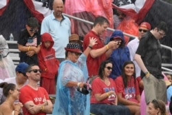 People wait for President Donald Trump to speak at an Independence Day celebration in front of the Lincoln Memorial in Washington, July 4, 2019.