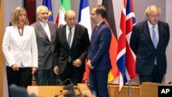 La cheffe de la diplomatie européenne Federica Mogherini, le ministre iranien des Affaires étrangères Javad Zarif, le ministre français des Affaires étrangères Jean-Yves Le Drian, le chef de la diplomatie allemande Heiko Maas, et le secretaire britannique au Foreign Office Boris Johnson, Bruxelles, Belgique, le 15 mai 2018. 