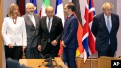 EU foreign policy chief Federica Mogherini, Iranian Foreign Minister Javad Zarif, French Foreign Minister Jean-Yves Le Drian, German Foreign Minister Heiko Maas, British Foreign Secretary Boris Johnson in Brussels, May 15, 2018.