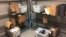 FILE - Packages from Internet retailers are delivered with the U.S. Mail in a apartment building mail room in Washington, April 13, 2018.