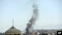 Smoke rises next to the U.S. Embassy in Kabul, Afghanistan, Aug. 15, 2021.