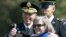 US Army General David Petraeus gives a thumbs-up during an Armed Forces Farewell Tribute and Retirement Ceremony in honor of Petraeus at Joint Base Myer-Henderson Hall in Arlington, Virginia, on August 31, 2011.