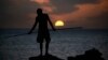 An Aboriginee is seen spear fishing in Australia's Northern Territory in this July 18, 2013, file photo.