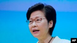 Kepala Eksekutif Hong Kong Carrie Lam berbicara saat konferensi pers di Hong Kong, Selasa, 11 Mei 2021. (Foto: AP)