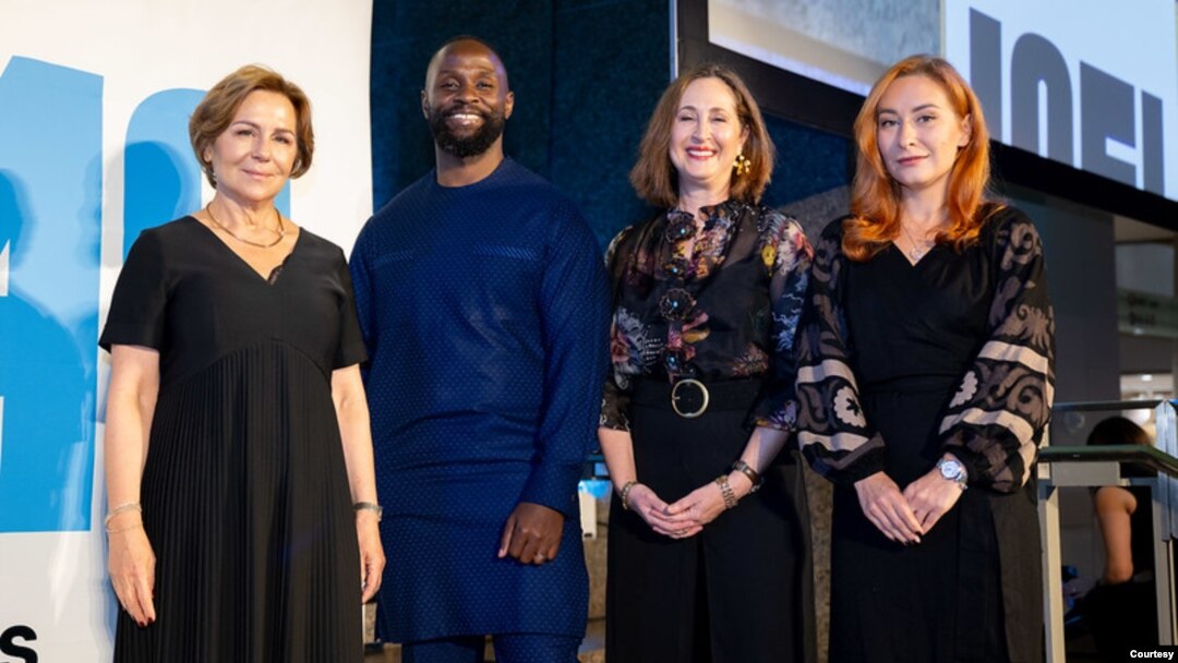 Journalists, from left, Rana Sabbagh, John-Allan Namu and Valeriya Yegoshyna, far right, pictured with Sharon Moshavi, second from right, president of the International Center for Journalists, in Washington. (International Center for Journalists photo) 