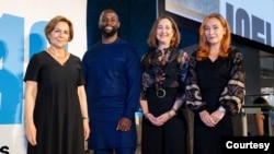 Journalists, from left, Rana Sabbagh, John-Allan Namu and Valeriya Yegoshyna, far right, pictured with Sharon Moshavi, second from right, president of the International Center for Journalists, in Washington. (International Center for Journalists photo) 