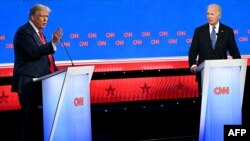 US President Joe Biden and former US President and Republican presidential candidate Donald Trump participate in the first presidential debate of the 2024 elections at CNN's studios in Atlanta, Georgia, on June 27, 2024. (Photo by ANDREW CABALLERO-REYNOLD