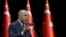 Turkey's President Recep Tayyip Erdogan speaks during a meeting in Ankara, Turkey, Feb. 11, 2020. Erdogan on Tuesday warned the Syrian government that it will "pay a very, very heavy price" for attacks on Turkish troops. 