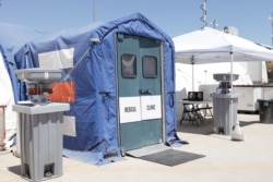 FILE - Medical facilities are seen at the Tornillo facility, a shelter for children of detained migrants, in Tornillo, Texas, in this undated handout photo provided by the US Department of Health and Human Services.