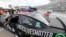 FILE - The car for driver Bubba Wallace has a Black Lives Matter logo as it is prepared for a NASCAR Cup Series auto race in Martinsville, Va., June 10, 2020.