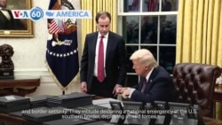 VOA60 America - President Trump issues series of executive orders on immigration