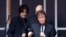 Singer Paul McCartney gestures to audience after playing a surprise mini-concert in New York's Times Square, Oct. 10, 2013.