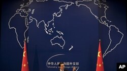 Chinese Foreign Ministry spokesman Hong Lei gestures during a news briefing at the Ministry of Foreign Affairs in Beijing, China. China, the world's most prolific executioner, put a Filipino man convicted of drug trafficking to death despite a clemency ap