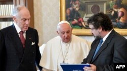 FILE - This photo taken and handout by The Vatican Media shows Pope Francis during an audience with Ronald Steven Lauder (L), President of the World Jewish Congress, in The Vatican on October 19, 2023. 