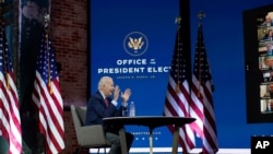 President-elect Joe Biden speaks during a meeting at The Queen theater Monday, Nov. 23, 2020, in Wilmington, Del.