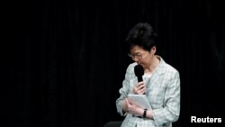 Hong Kong Chief Executive Carrie Lam reacts during the first community dialogue session in Hong Kong, Sept. 26, 2019.
