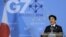 Japan's Prime Minister Shinzo Abe holds a news conference at the end of the G7 summit at the European Council headquarters in Brussels, June 5, 2014.