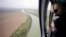 FILE - U.S. Customs and Border Protection Air and Marine agents patrol along the Rio Grande on the Texas-Mexico border near Rio Grande City, Texas, Feb. 24, 2015.