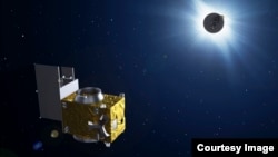 This artist illustration shows one of two satellites - part of the European Space Agency's Proba-3 mission - positioned for a simulated total solar eclipse.
(Image Credit: CREDIT - ESA-P. Carril, 2013)