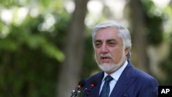 FILE - Abdullah Abdullah, chairman of the High Council for National Reconciliation, speaks during a news conference in Kabul, Afghanistan, May 30, 2020. 