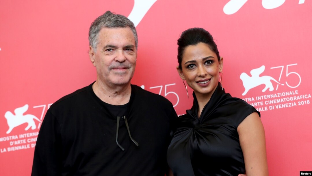 Director Amos Gitai and actor Maisa Adb Elhadi are pictured during a photo call for the films "A Letter to a Friend in Gaza" and "A Tramway in Jerusalem" at the 75th Venice International Film Festival, Sept. 3, 2018.