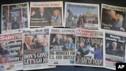 A selection of the front pages of British national newspapers on sale in London, Jan. 21, 2021, showing the headlines following the inauguration of President Joe Biden.
