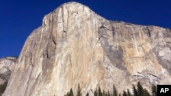 This photo shows El Capitan in Yosemite National Park, Calif. An American rock climber has become the first to climb alone to the top of the wall without ropes or safety gear. 