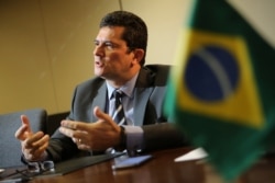 Brazil's Justice Minister Sergio Moro talks during an interview with Reuters in Brasilia, Brazil, Aug. 12, 2019.