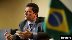 Brazil's Justice Minister Sergio Moro talks during an interview with Reuters in Brasilia, Brazil, Aug. 12, 2019. 