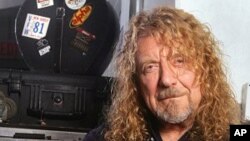 In this July 30, 2010 photo, singer Robert Plant poses for a portrait backstage moments before performing with Band Of Joy at Miami's Bayfront Amphitheatre