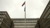 The U.S. national flag is pictured at the Office of Personnel Management building in Washington, June 5, 2015.