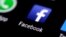 FILE: The Facebook application is seen on a phone screen, Aug. 3, 2017. 
