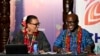 Commonwealth Secretary General Patricia Scotland, left, chats with Rwanda's Minister of Foreign Affairs Olivier Nduhungirehe at the Commonwealth Heads of Government Meeting in Apia, Samoa, Oct. 26, 2024. (William West/Pool Photo via AP)