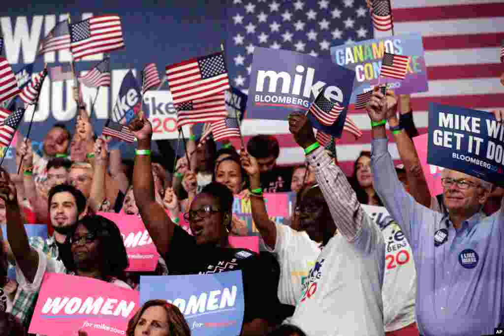 Supporters of Democratic presidential candidate former New York City Mayor Mike Bloomberg attend a primary election night campaign rally in West Palm Beach, Fla., March 3, 2020.