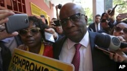 Former Supreme Court President Joaquim Barbosa, the first black member of the country's top court, arrives for a meeting with the leaders of the Brazilian Socialist Party, April 19, 2018. 