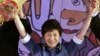 Former Saenuri Party leader Park Guen-hye waves to supporters during a national convention of the ruling Saenuri Party for a presidential primary in Goyang, South Korea, August 20, 2012.