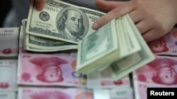 Đồng Nguyên hay Nhân Dân tệ của Trung Quốc đã qua mặt đồng đôla Úc và Canada trong năm ngoái. Chỉ tệ Trung Quốc chỉ đứng sau đồng đôla Mỹ, đồng Euro, đồng bảng Anh và đồng Yen của Nhật Bản.
