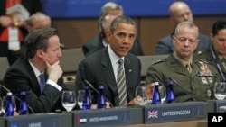 President Barack Obama speaks at the start of the International Security Assistance Force (ISAF) meeting on Afghanistan at the NATO Summit in Chicago, May 21, 2012.